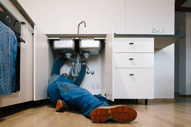 Professional Plumbing technician working in Urbana, MD